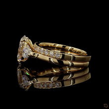 Load image into Gallery viewer, The Juliet Bridal Set | 2ct Oval Lab Diamond | Pear Side Stones | Pavé Band | 14k Yellow Gold