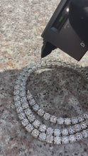 Load and play video in Gallery viewer, Glacial Jewels Exclusive Moissanite Tennis Necklace in Sterling Silver