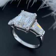 Load image into Gallery viewer, Moissanite 5.20ctw Emerald Cut with Trapezoid Accent Engagement Ring in 14k White Gold