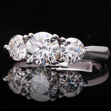 Load image into Gallery viewer, Moissanite Round Cut 3 Stone Solitaire Ring w/ Platinum Plated Sterling Silver