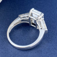Load image into Gallery viewer, Moissanite 5.20ctw Emerald Cut with Trapezoid Accent Engagement Ring in 14k White Gold