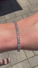 Load and play video in Gallery viewer, Glacial Jewels 3mm Moissanite Tennis Bracelet in Sterling Silver