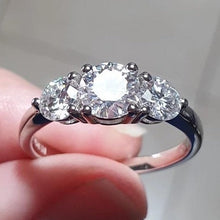 Load image into Gallery viewer, Moissanite Round Cut 3 Stone Solitaire Ring w/ Platinum Plated Sterling Silver