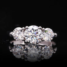 Load image into Gallery viewer, Moissanite Round Cut 3 Stone Solitaire Ring w/ Platinum Plated Sterling Silver