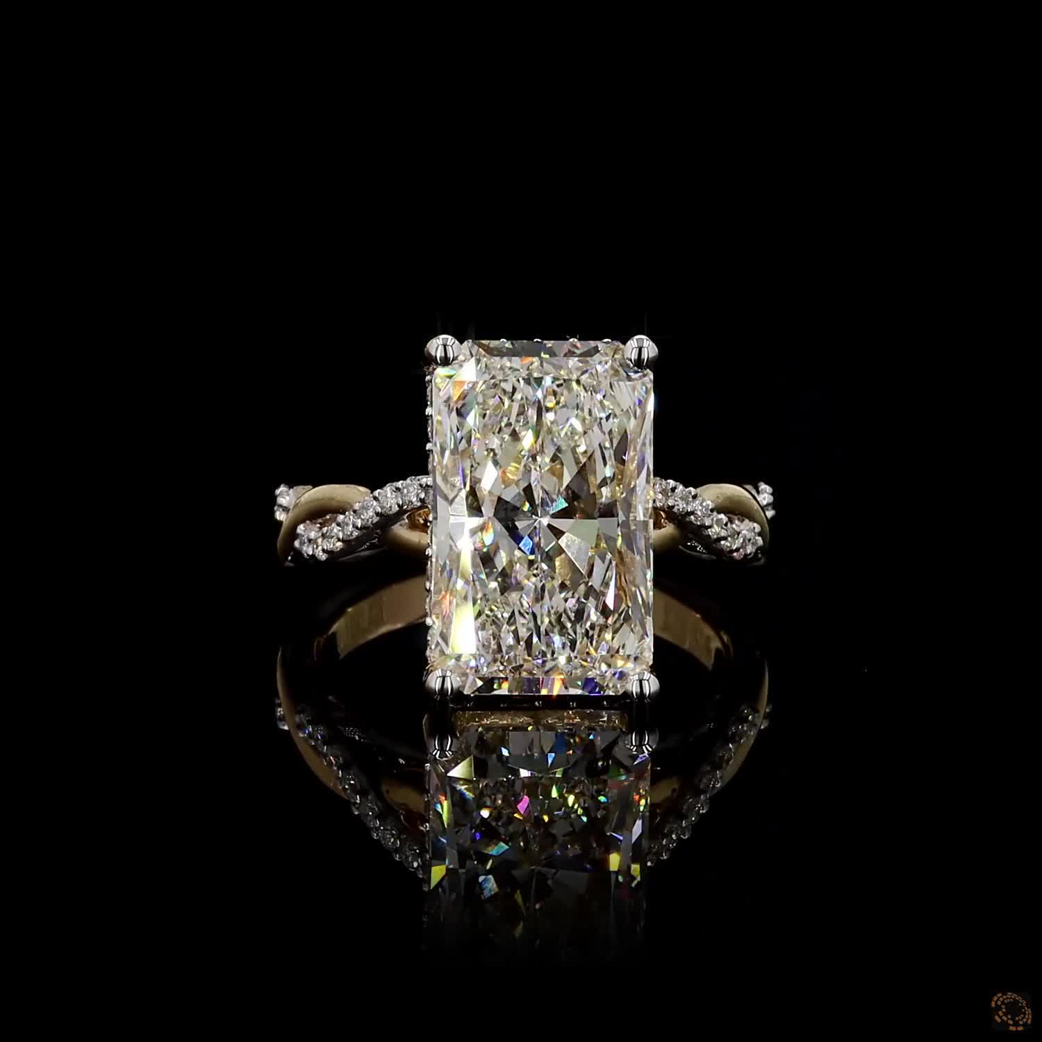 The Aurora Ring — 5.00ct radiant cut lab diamond in a twisted pavé band with hidden halo