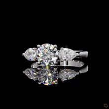 Load image into Gallery viewer, The Clara Ring — 1.50ct Round with Pear Accents Three-Stone
