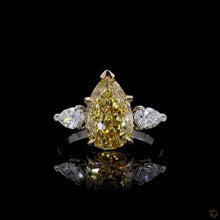 Load image into Gallery viewer, The Mirabel 3.50ct yellow pear lab diamond three-stone ring in two-tone 14k gold, front view
