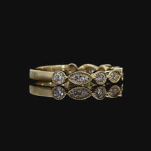 Load and play video in Gallery viewer, The Emmeline Band — Marquise &amp; Round Diamond Wedding Band
