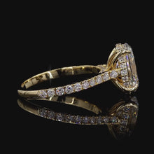 Load and play video in Gallery viewer, The Isabelle Ring | 2ct Oval Lab Diamond | Hidden Halo | Pavé Band | 14k Yellow Gold
