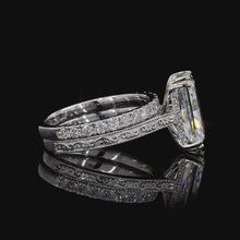 Load and play video in Gallery viewer, The Violette Bridal Set | 3ct Radiant Cut Lab Diamond | Claw Prong Solitaire | Engraved Pavé Bands | 14k White Gold
