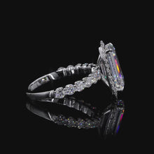Load and play video in Gallery viewer, The Seraphina Ring | 2.50ct Elongated Emerald Cut Lab Diamond | Diamond Halo | Pavé Band | 14k White Gold
