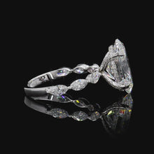 Load and play video in Gallery viewer, The Genevieve Ring — 5.00ct Oval Cut with Marquise Bubble Band
