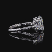 Load and play video in Gallery viewer, The Beatrix Ring | 3ct Elongated Cushion Cut Lab Diamond | Trillion Accents | 14k White Gold

